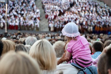 Audience of Song and dance festival concert in Riga clipart