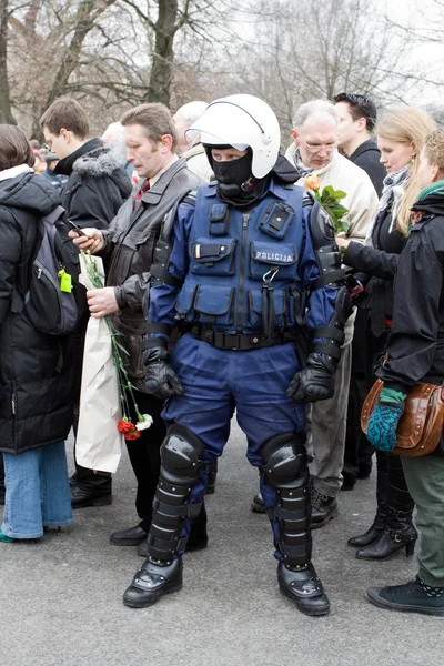 Riot police in crowd — Stock Photo, Image