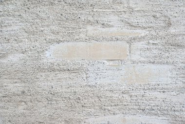 Rough white wall with bricks clipart