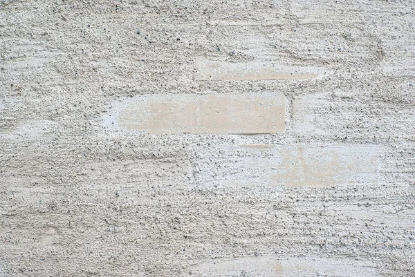 Rough white wall with bricks — Stock Photo, Image