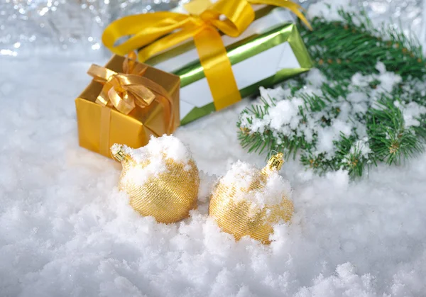 Golden Christmas on snow — Stock Photo, Image