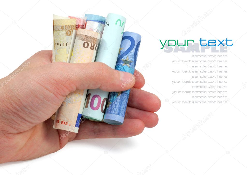 Euro banknotes in a hand on white background