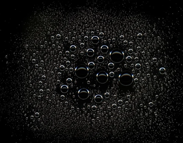 Krople wody na czarnym tle — Zdjęcie stockowe