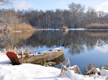 Winter Landscape with a fishing boat clipart