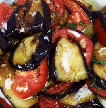 Roasted eggplants with tomato clipart