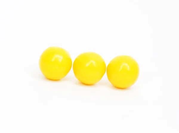 Drei gelbe Vitamine — Stockfoto