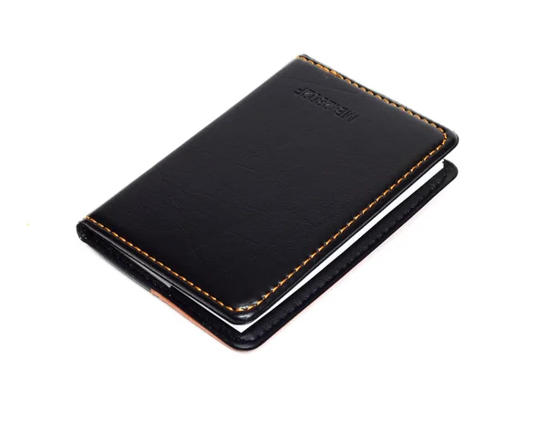 Pequeño cuaderno negro con tapa en blanco — Foto de Stock