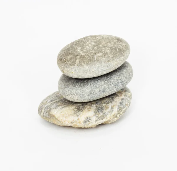 Pilha de pedras isoladas no fundo branco — Fotografia de Stock