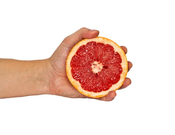 Half of grapefruit in female hand. Isolation. — Stock Photo, Image