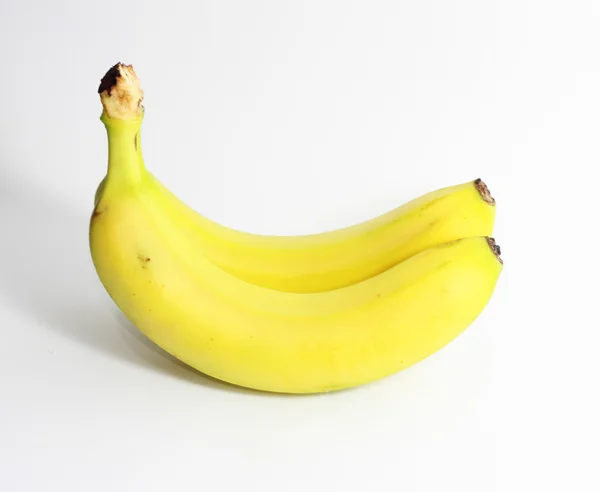 Dwa banany izolowane na białym tle — Zdjęcie stockowe