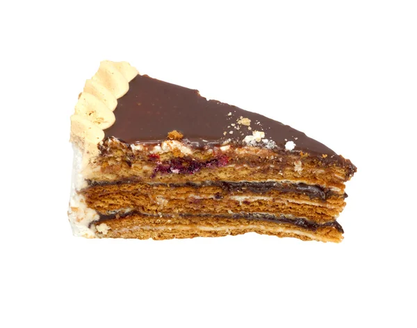 Um pedaço de bolo de chocolate, isolado em um fundo branco . — Fotografia de Stock