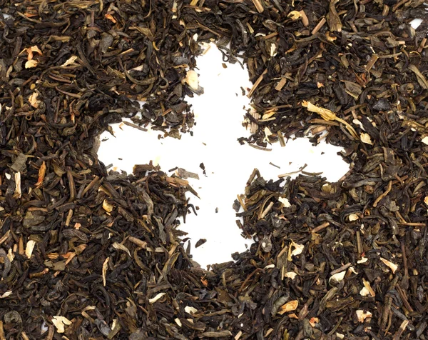 Sucha zielona herbata na białym tle — Zdjęcie stockowe