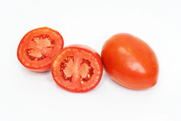 Tres tomates frescos sobre fondo blanco . — Foto de Stock