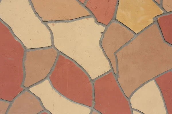 Mosaico irregular de parede ao ar livre — Fotografia de Stock