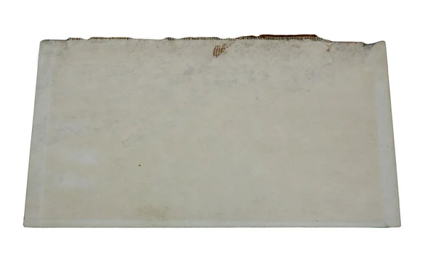 Een geïsoleerde oud grunge papier met gebrande rand — Stockfoto