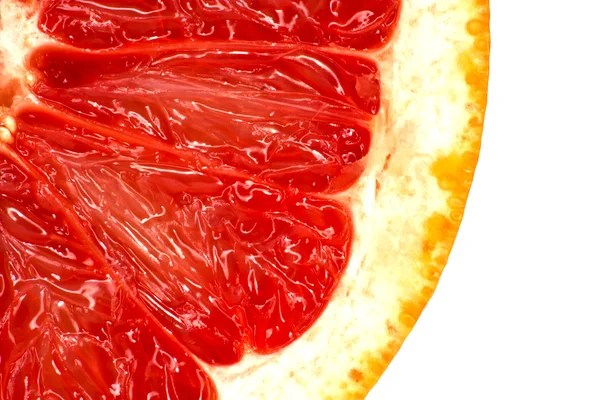 Червоний грейпфрут крупним планом макрозйомка — стокове фото