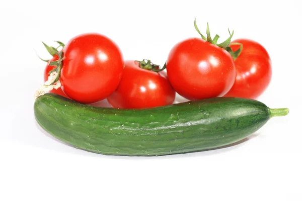 stock image Fresh cucumber and tomatoes on white background