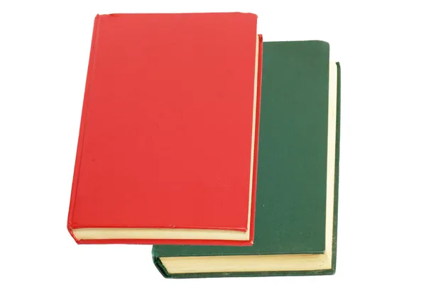 녹색 책 그리고 흰색 바탕에 빨간 책 — 스톡 사진
