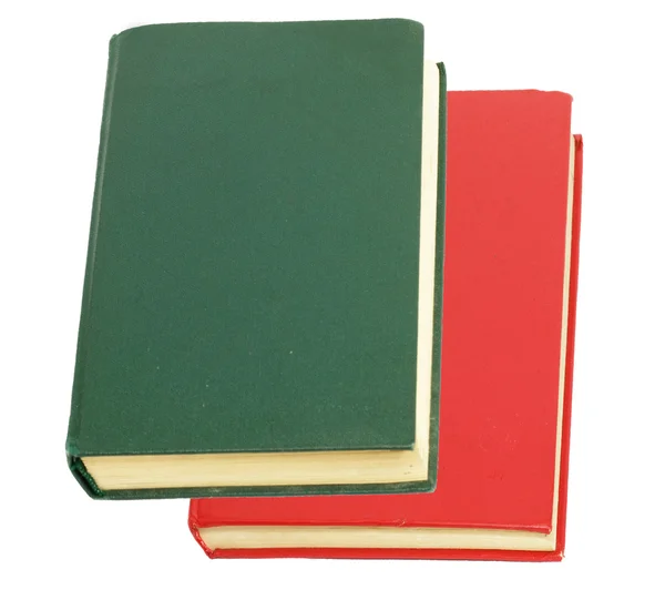 绿色书和在白色背景上的红色书 — 图库照片