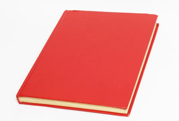 Livro vermelho sobre fundo branco — Fotografia de Stock