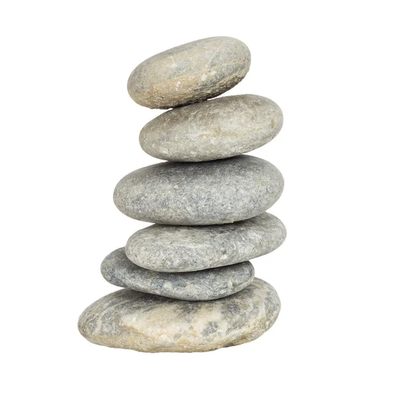 A stack of slightly off-balanced zen stones isolated on white ba — Stock Photo, Image