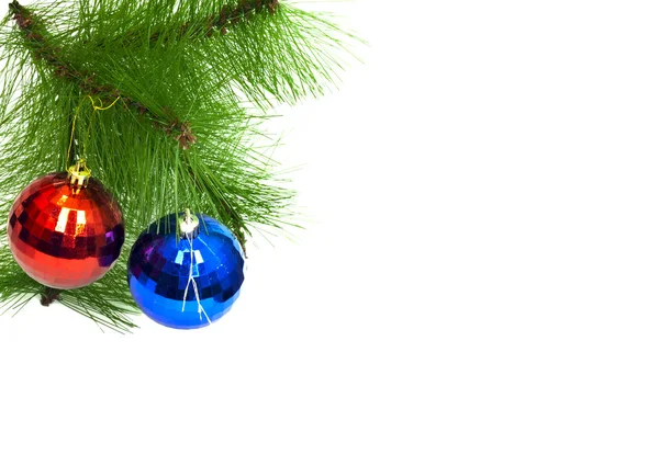 Zwei Weihnachtsspielzeuge auf weißem Hintergrund — Stockfoto