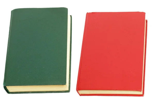 绿色书和在白色背景上的红色书 — 图库照片