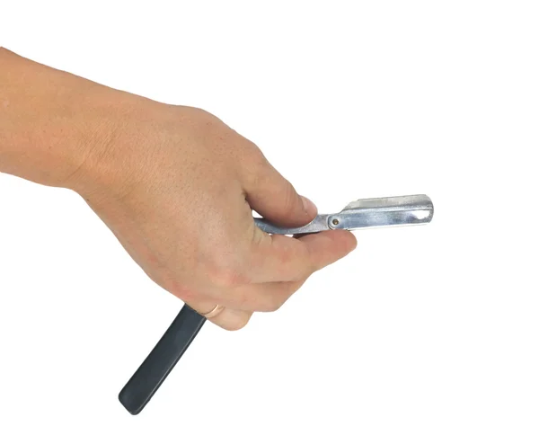 Hand som håller klassisk rakkniv på vit bakgrund — Stockfoto