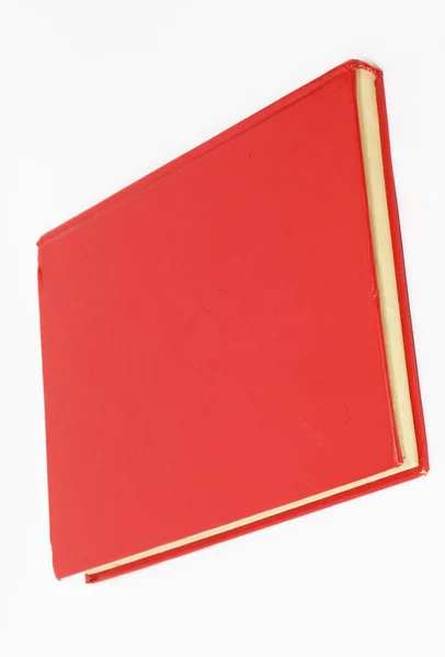 Beyaz arkaplan üzerine kırmızı kitap — Stok fotoğraf