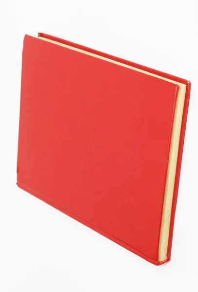 Rood boek over witte achtergrond — Stockfoto