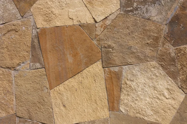 Неподібний кам'яний візерунок стін, стіна з каменів — стокове фото