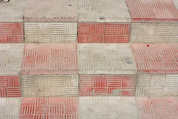 Een abstracte trap met keramische tegels. — Stockfoto