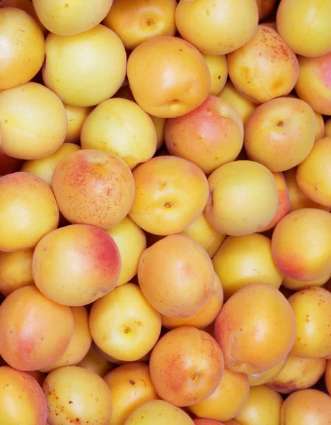 Färska naturliga aprikos bakgrund — Stockfoto