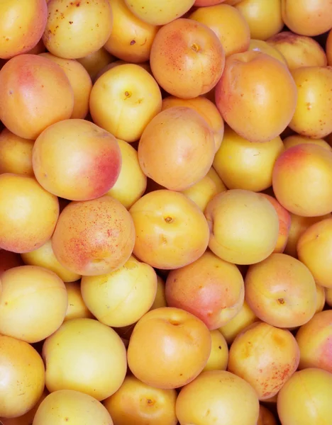 Färska naturliga aprikos bakgrund — Stockfoto