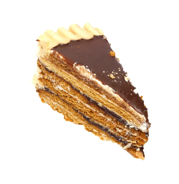 Um pedaço de bolo de chocolate, isolado em um fundo branco . — Fotografia de Stock