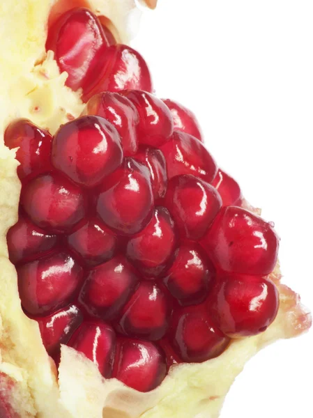 Ytterst nær bakgrunnen til et rødt, saftig, modent granateple frui – stockfoto