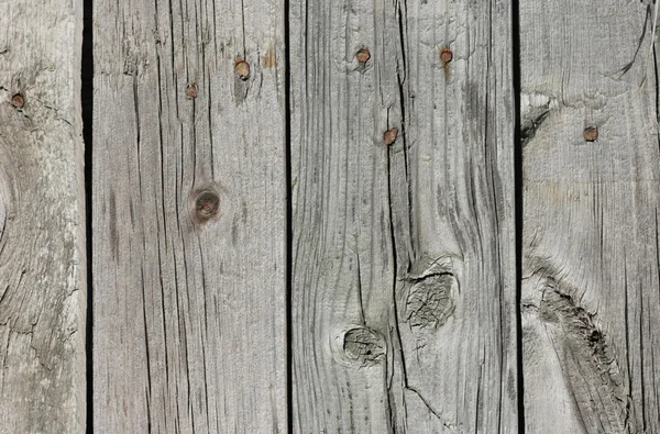 Zavřít šedé dřevěné plotové desky — Stock fotografie