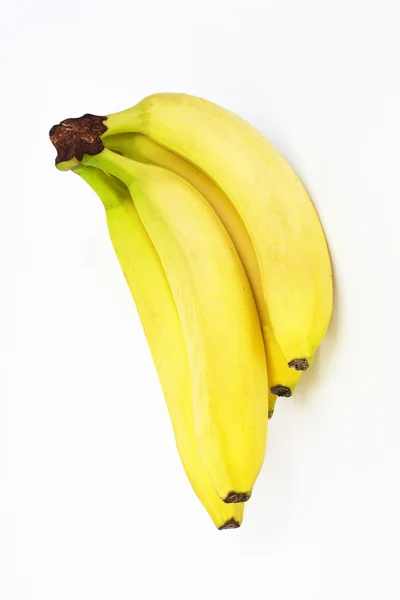 Foto de una gavilla de plátanos sobre un fondo blanco — Foto de Stock