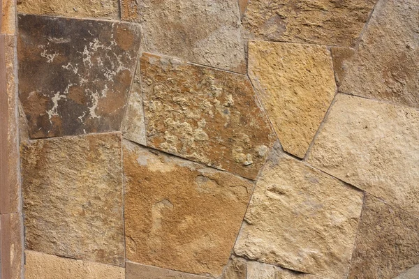 不定型石头墙上的图案，墙的岩石 — 图库照片