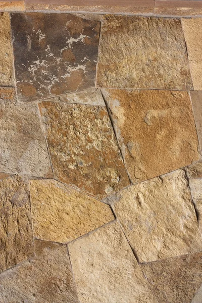 Unshaped stone wall pattern,wall made of rocks — Stock Photo, Image