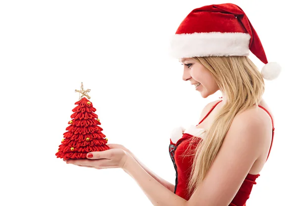 Young woman dressed as Santa Claus holds a Christmas gift in han — Stock Photo, Image