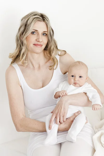 Portrait of mother with her baby Royalty Free Stock Photos