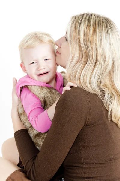 Portrait of mother with her crying little daughter — Stock Photo, Image