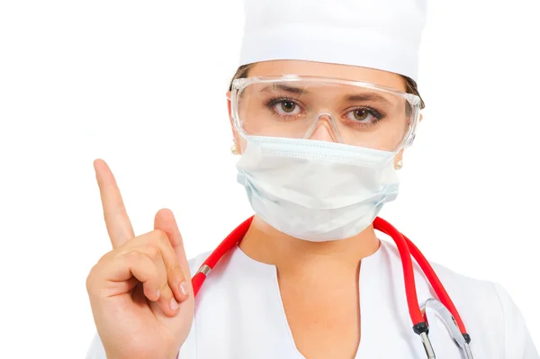 Joven médico en una máscara advierte —  Fotos de Stock