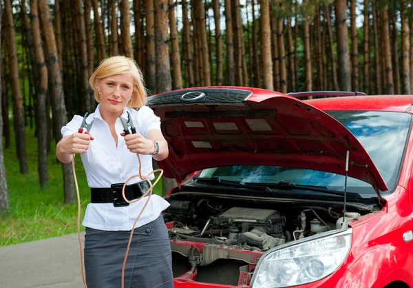 The girl asks for help charge the battery — Stock Photo, Image