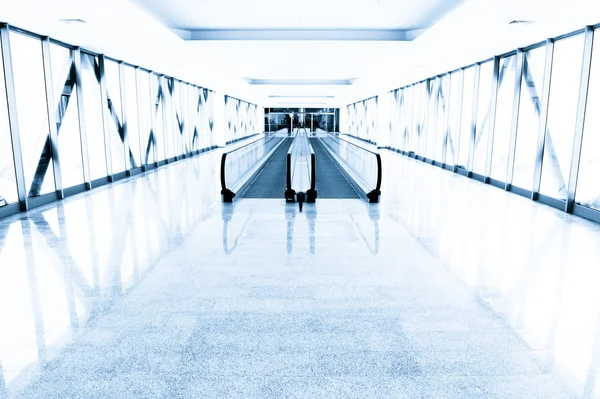 Blue glass corridor in office centre — Stock Photo, Image