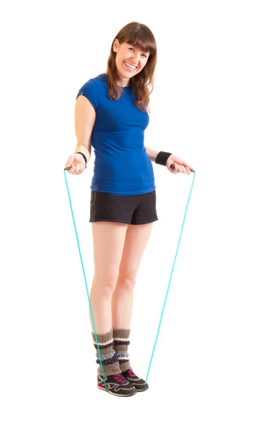 Young woman jumping on skipping rope — Stock Photo, Image