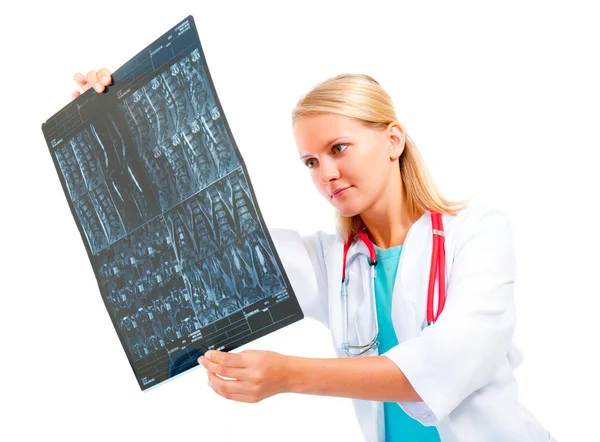 Young doctor examining an x-ray image — Stock Photo, Image