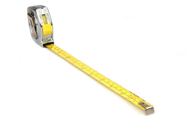 Herramienta de medición de cinta amarilla sobre fondo blanco —  Fotos de Stock