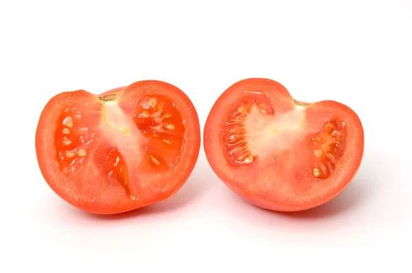 Tomato slices, lobules on the white — Stock Photo, Image